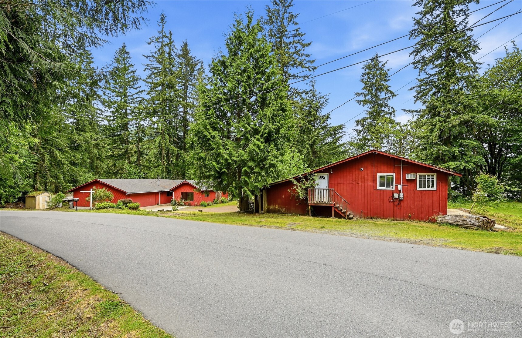 Primary home in Distance and entrance to the office on 2nd level of the Barn.