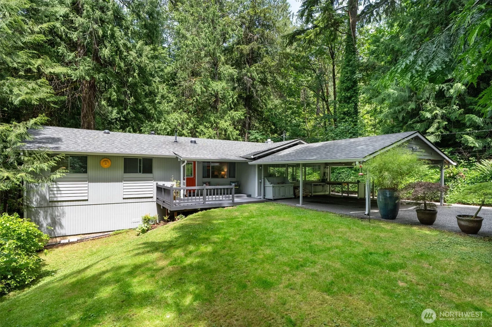 Your new home is nestled amongst the trees complete with springs and a babbling creek.