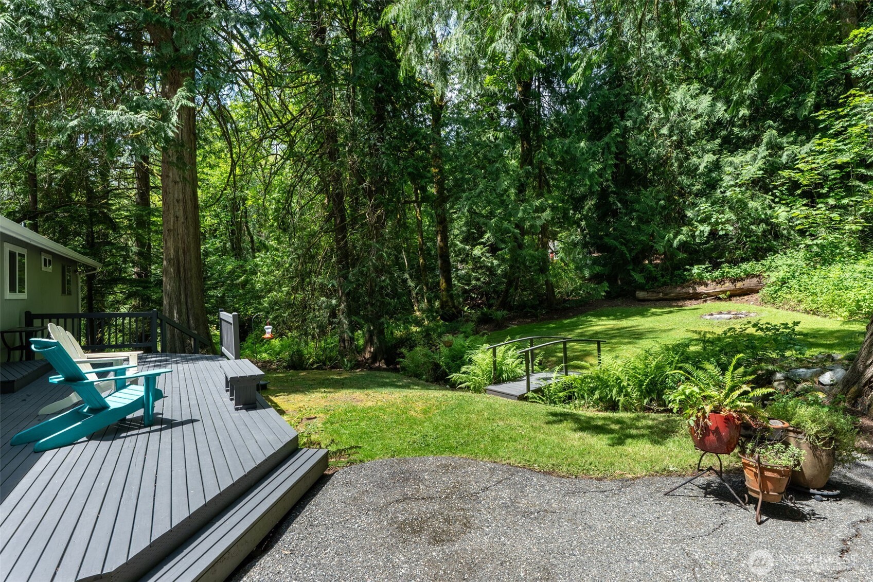 Just over the bridge you have your private fire pit to enjoy anytime you want.