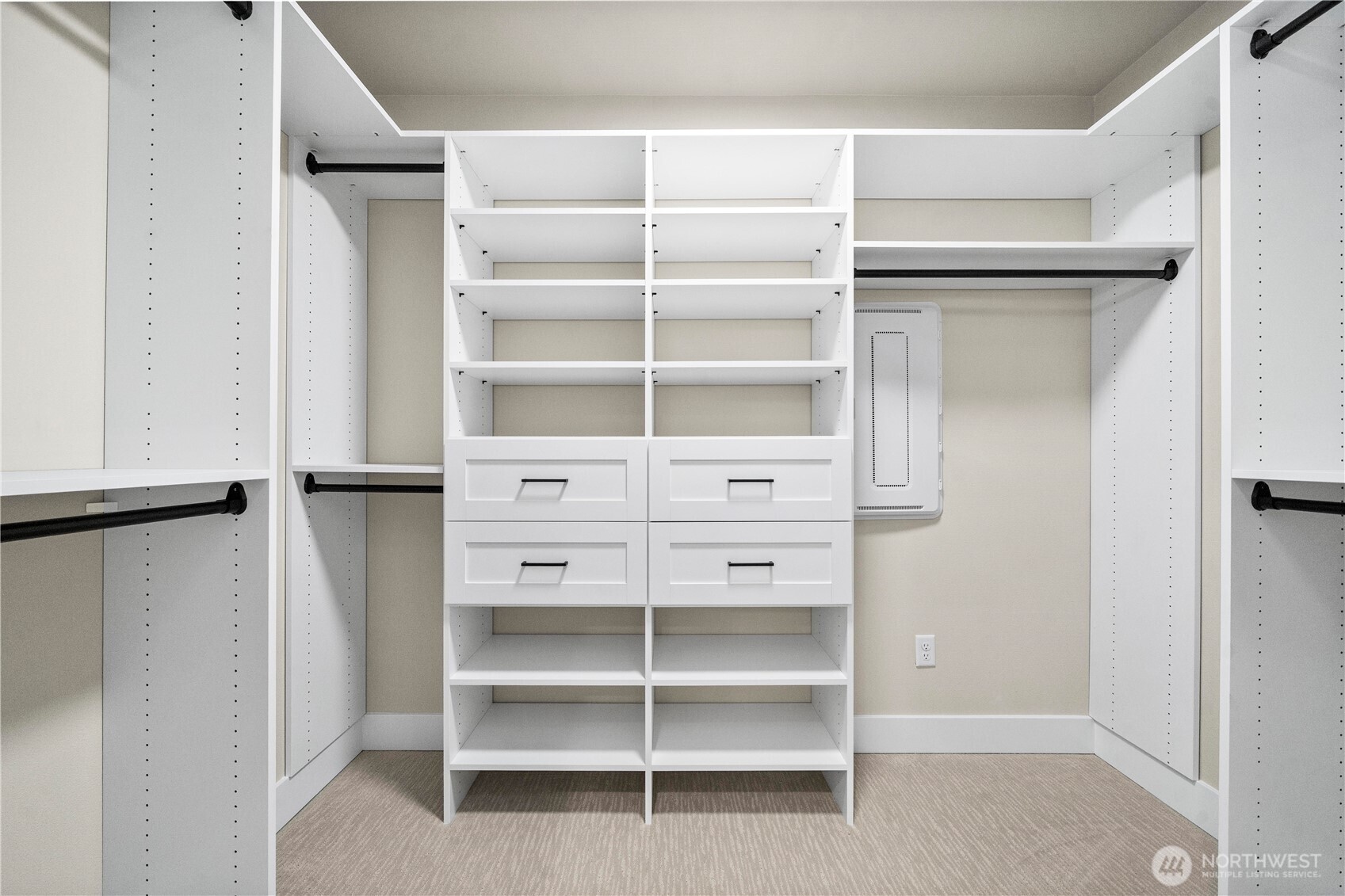 Primary walk-in-closet with built in organizer