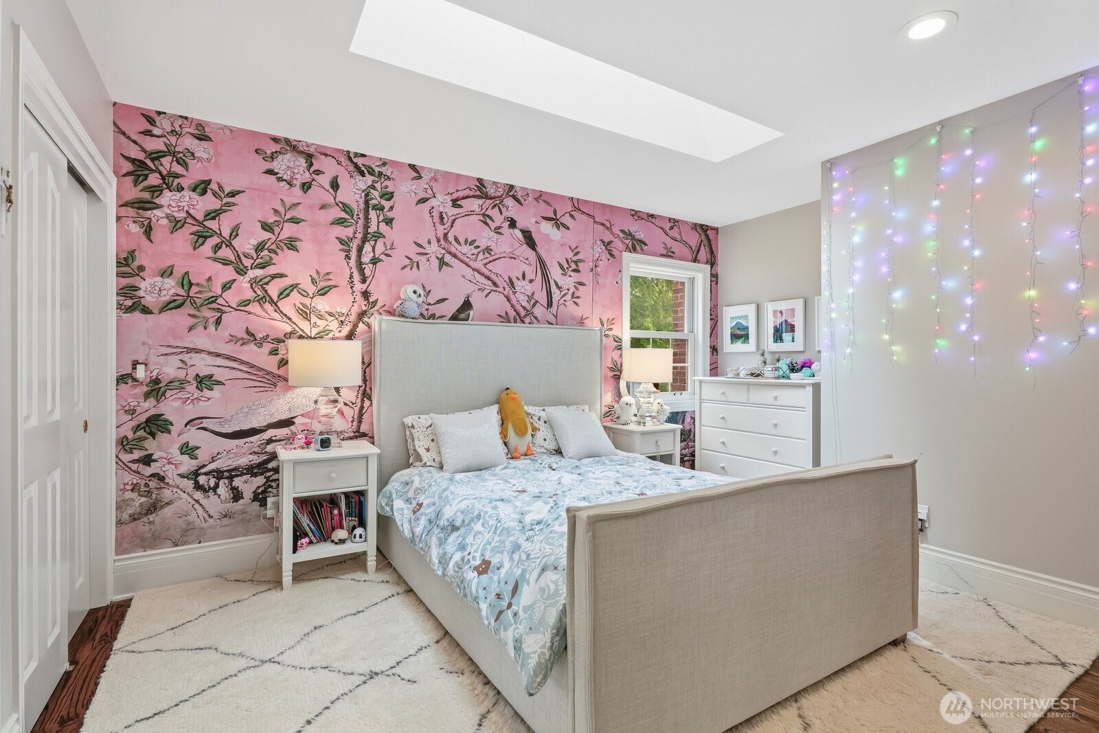 Beautiful bedroom with designer wall covering, new skylight and en-suite bathroom.