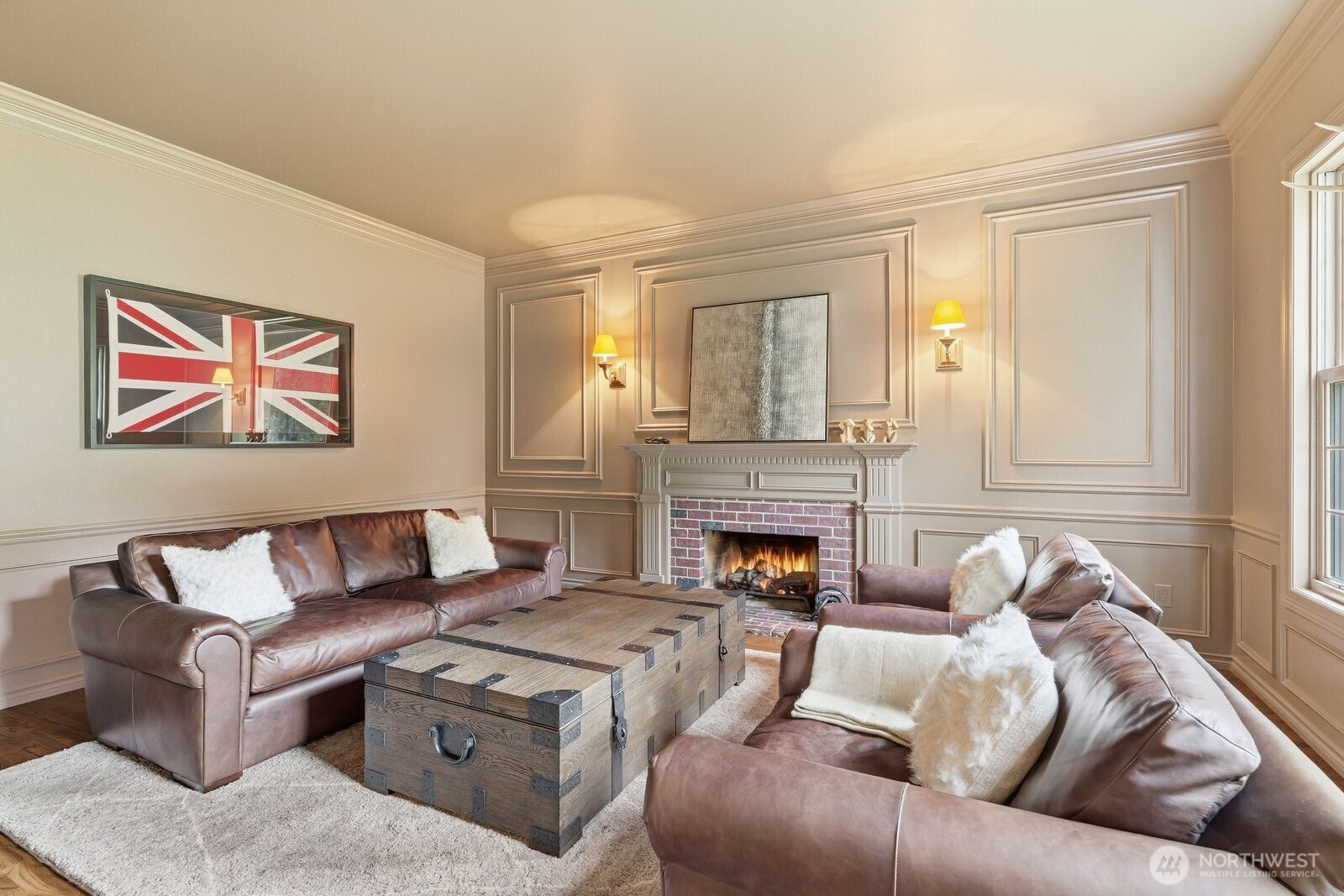 Designed for both grand entertaining and everyday living, the moody pub vibe lounge offers a cozy wood burning fireplace and graceful color drenched millwork.