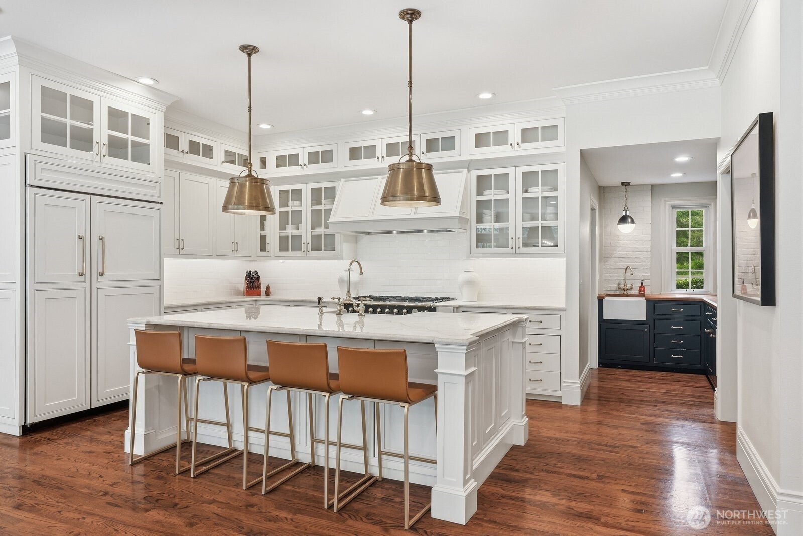 Abundant floor-to-ceiling custom cabinetry.