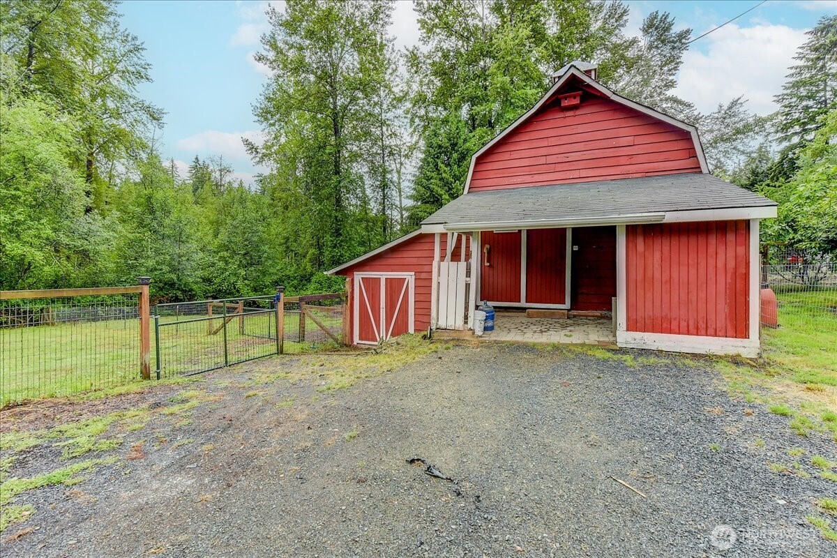 2 stall barn with tractor bay and hay loft