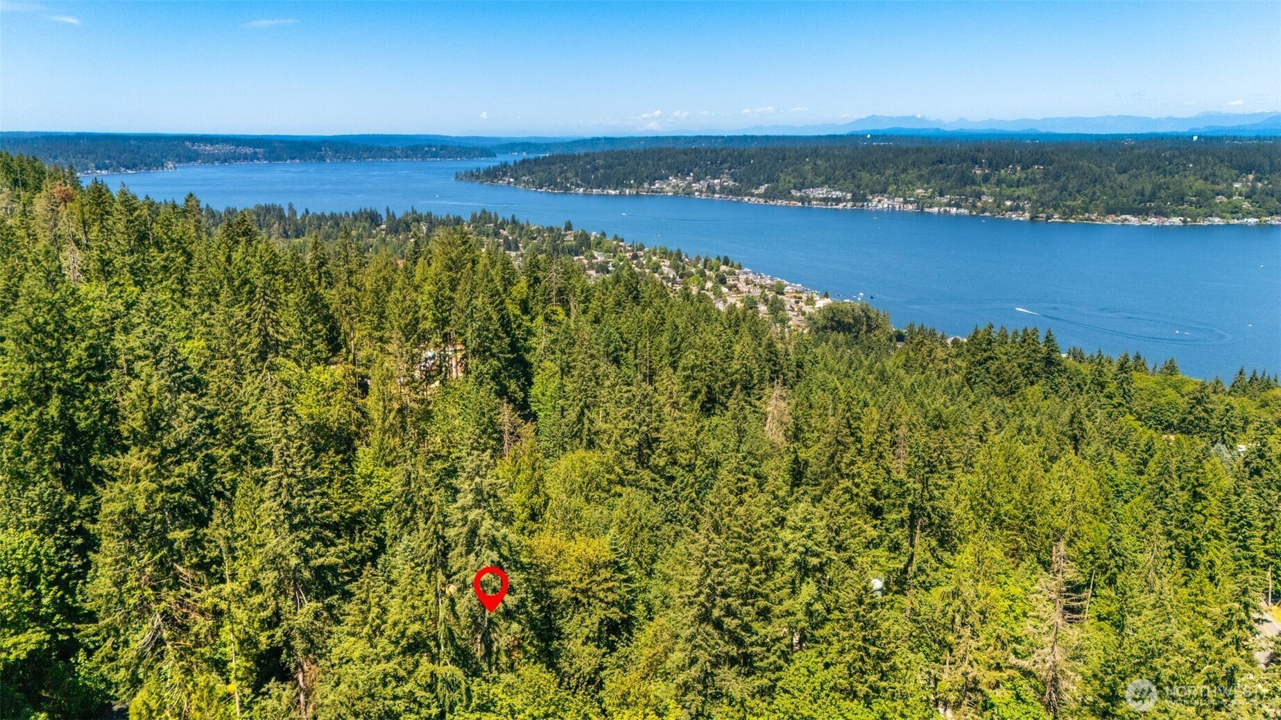 The secluded setting offers the feel of a private retreat while remaining just minutes from Issaquah, Bellevue, and major employment centers.