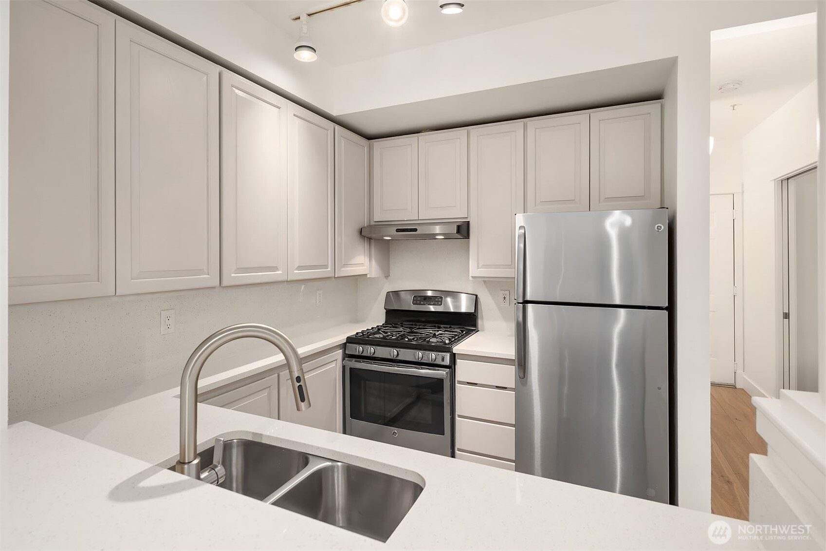 Updated kitchen with solid surface countertops