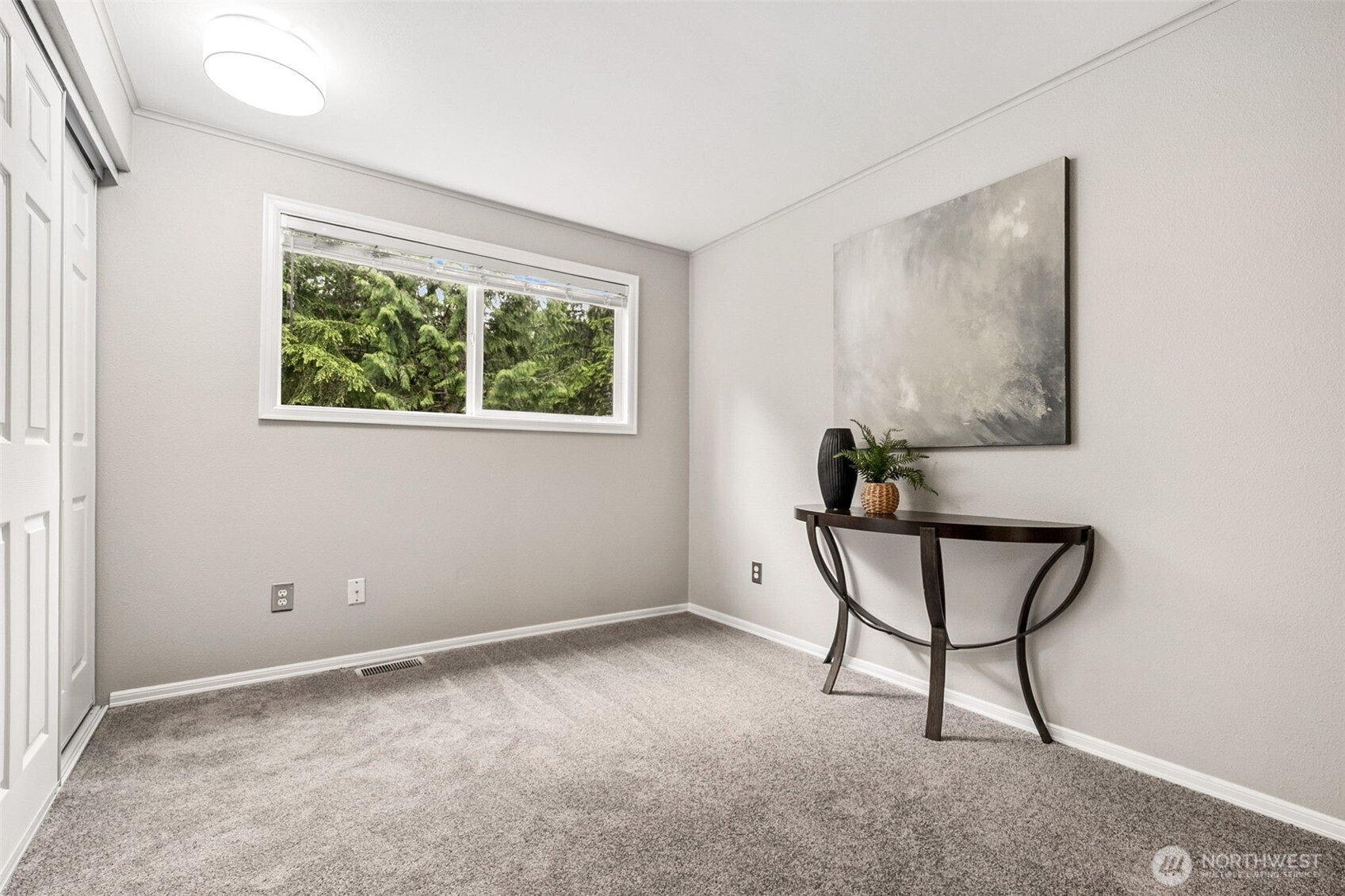 One of the three additional bedrooms on the upper level.