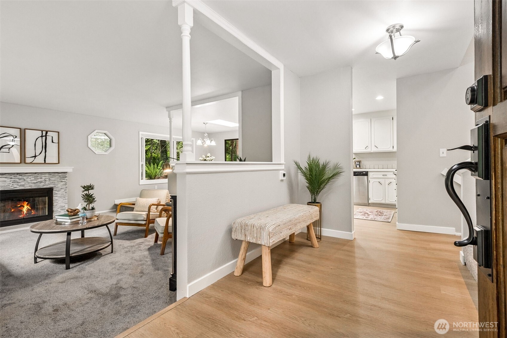 Welcome home! Front entry is fully covered for all your winter entertaining, when guests can stay dry while waiting for you to answer the door! Beautiful original solid wood door with inlay, and glass block side window which lets in light but provides privacy.