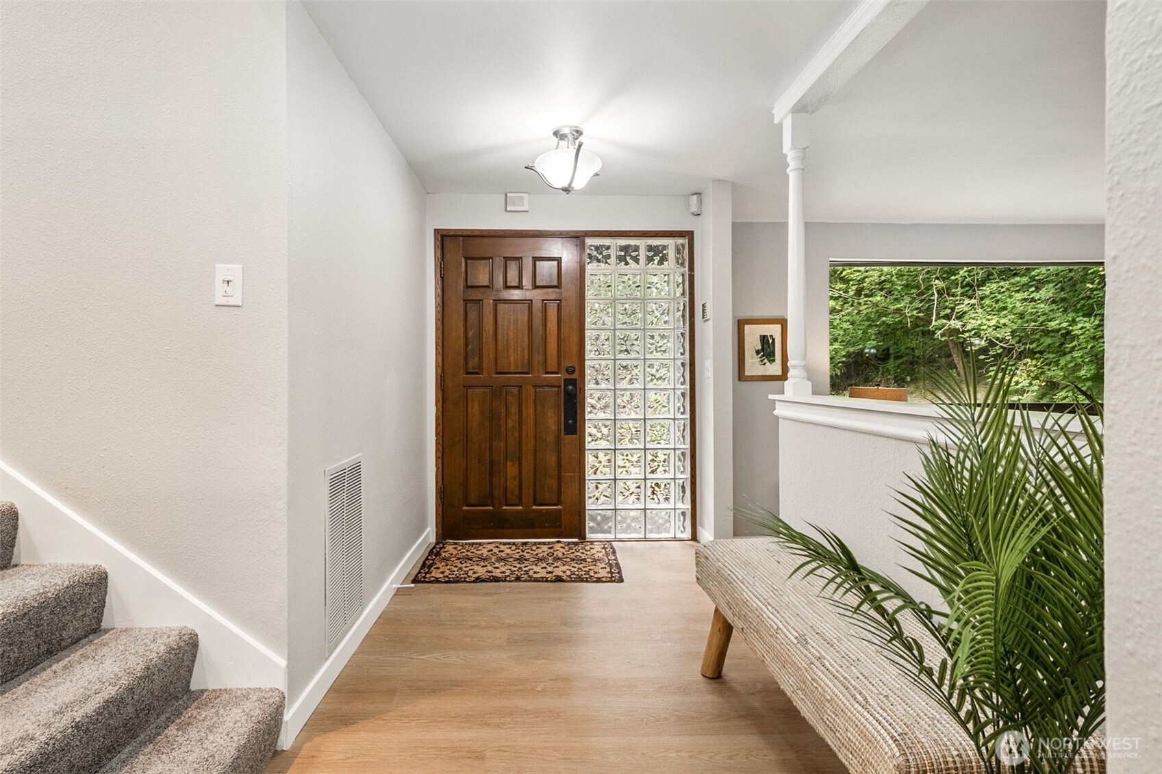 Entry w/new flooring, lighting and paint!
