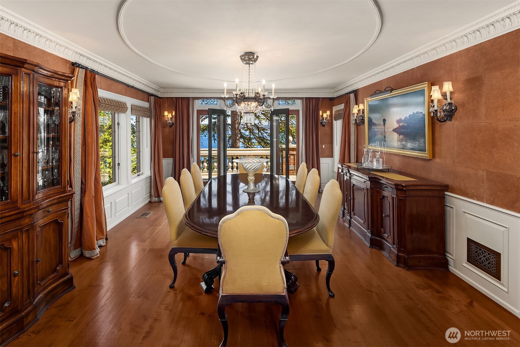The dining room is set for formal dining and dinner parties.