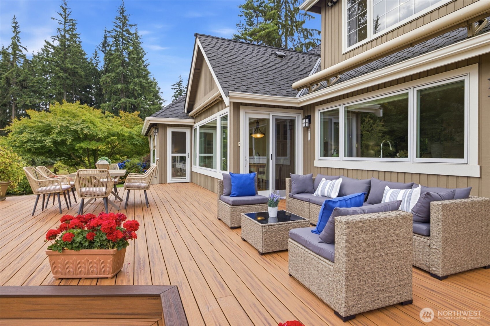 Almost 1000 sq feet of Trex deck accessed through the kitchen and features retractable awnings to make it comfortable year round