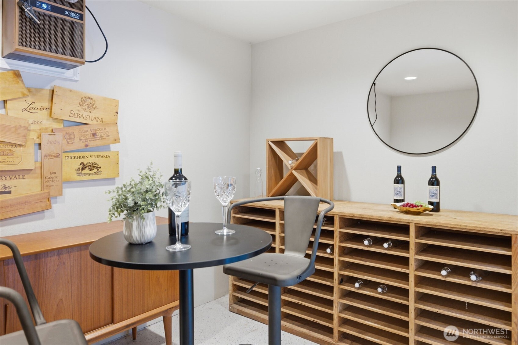 Accessed off the shop, the spacious temperature controlled wine room