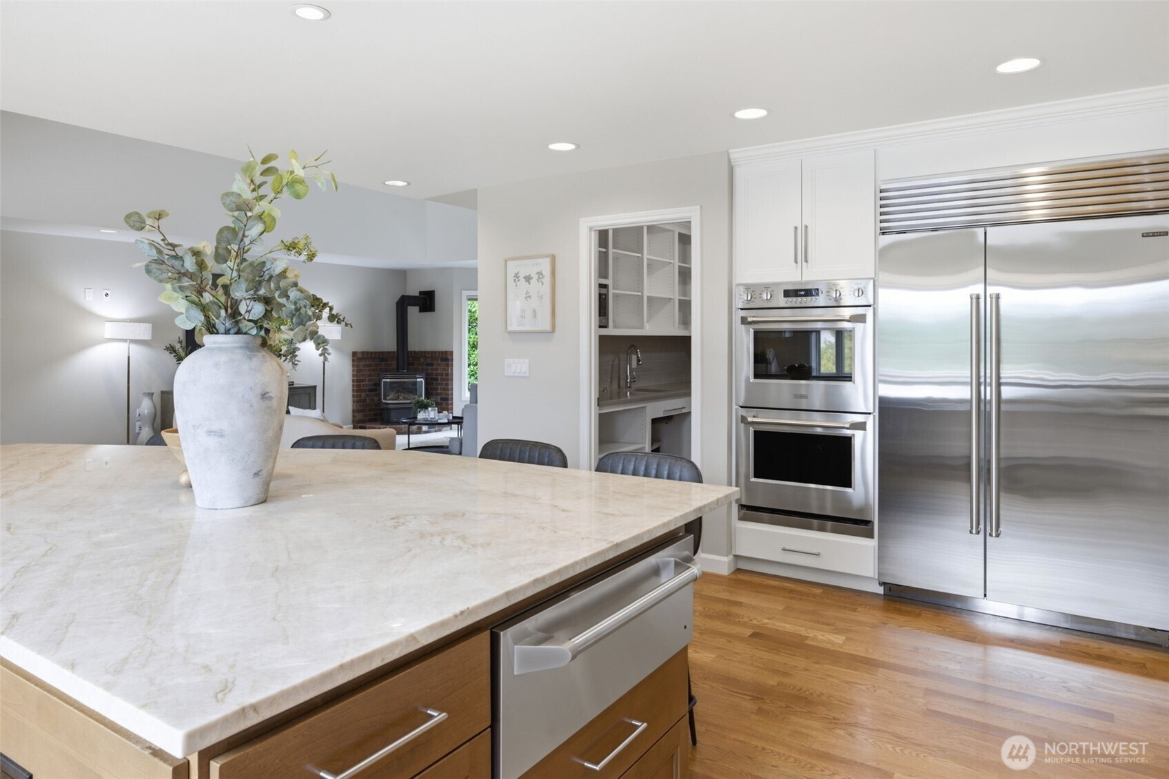 Generously sized center island is a natural gathering place for friends and family