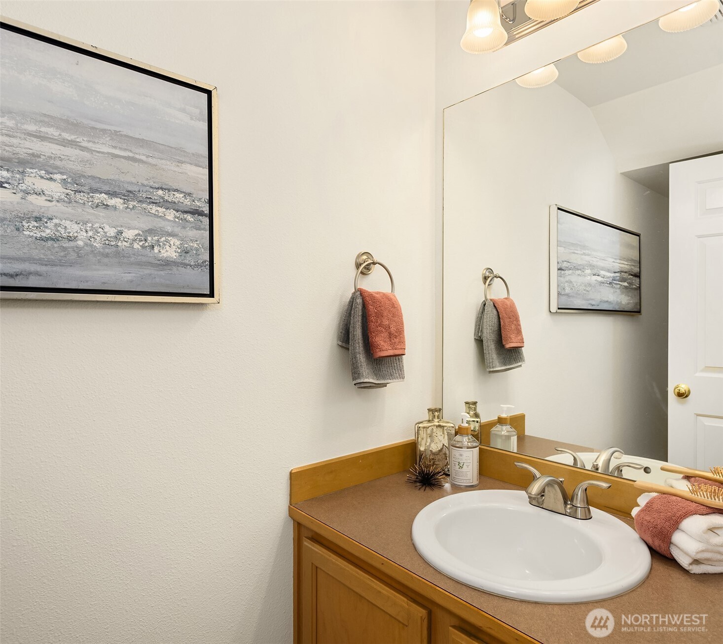 Rounding out the main level is this powder room that is located off the entry.