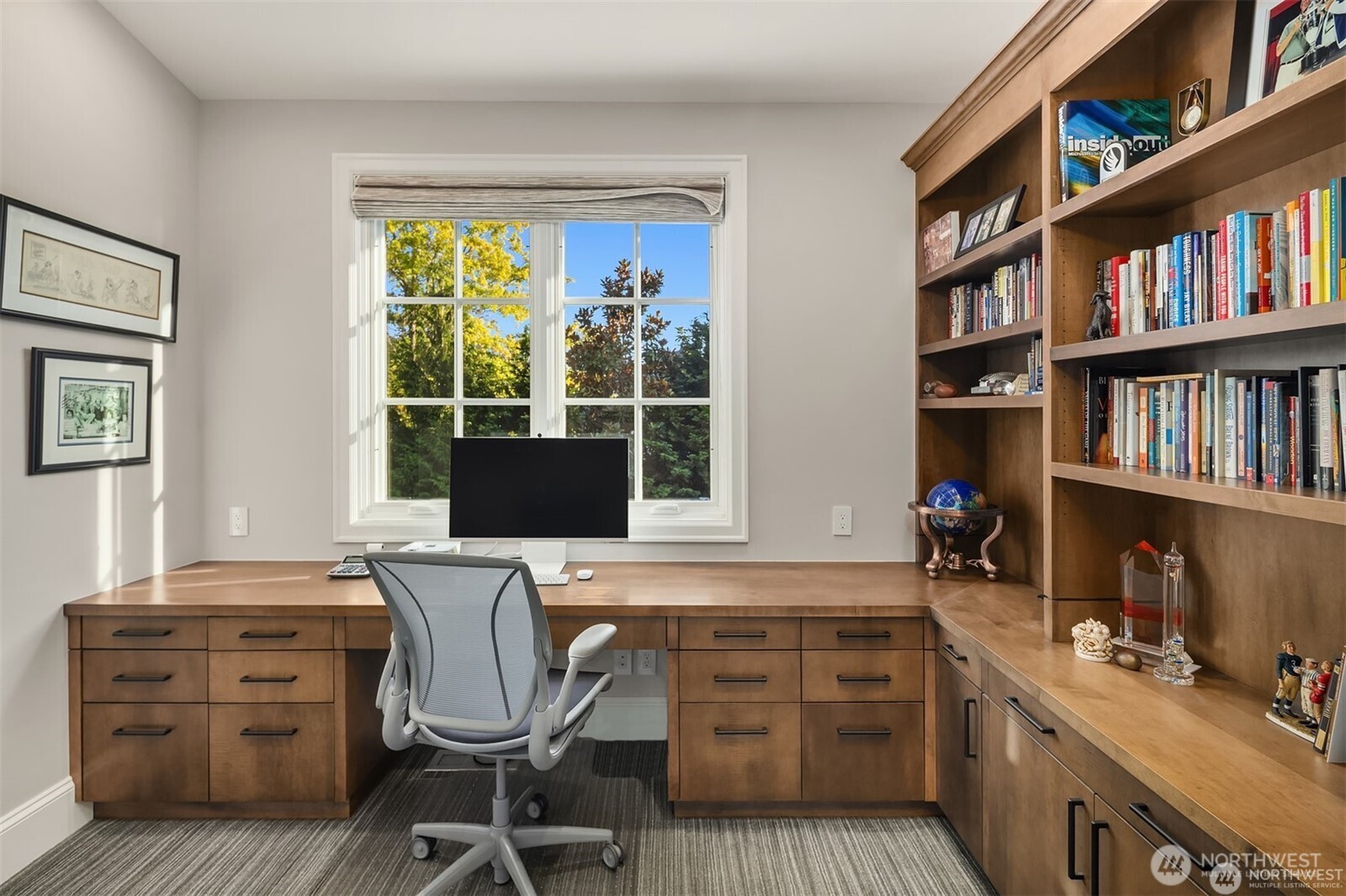 The perfect office space nestled above the garage providing autonomy and flexibility.