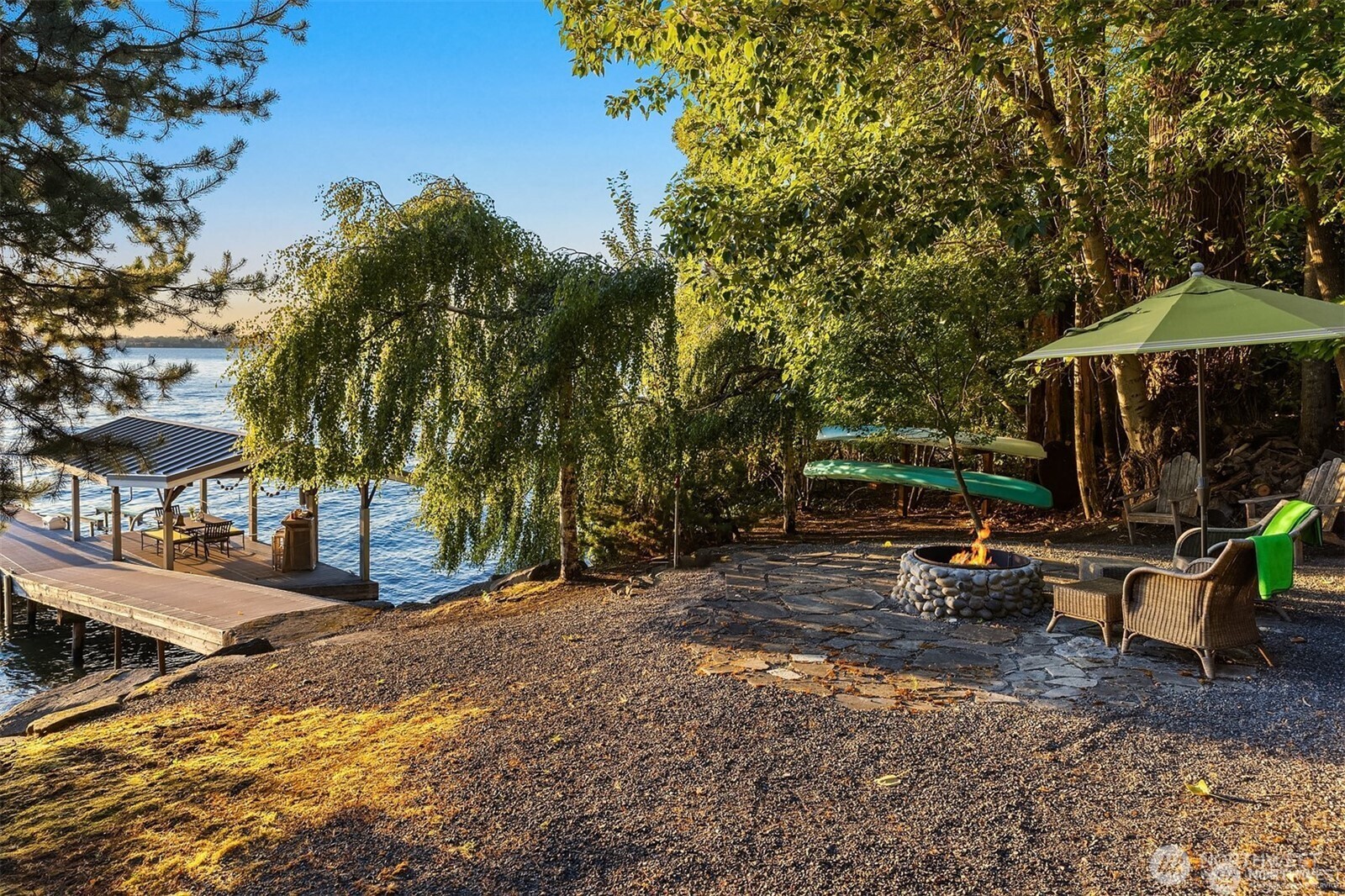 Enjoy this sweet beach and easy water access for kayaking, paddleboarding, swimming and evening bonfires.