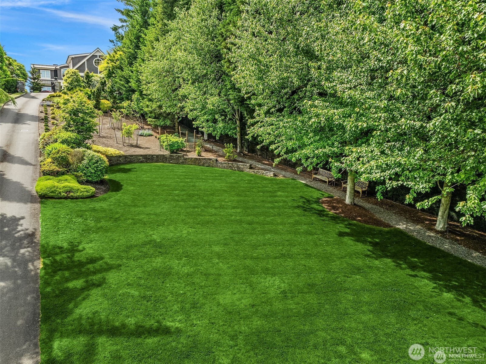 This estate has two separate tax parcels and addresses. : 2409 and 2405- giving you optionality and privacy as you wish.