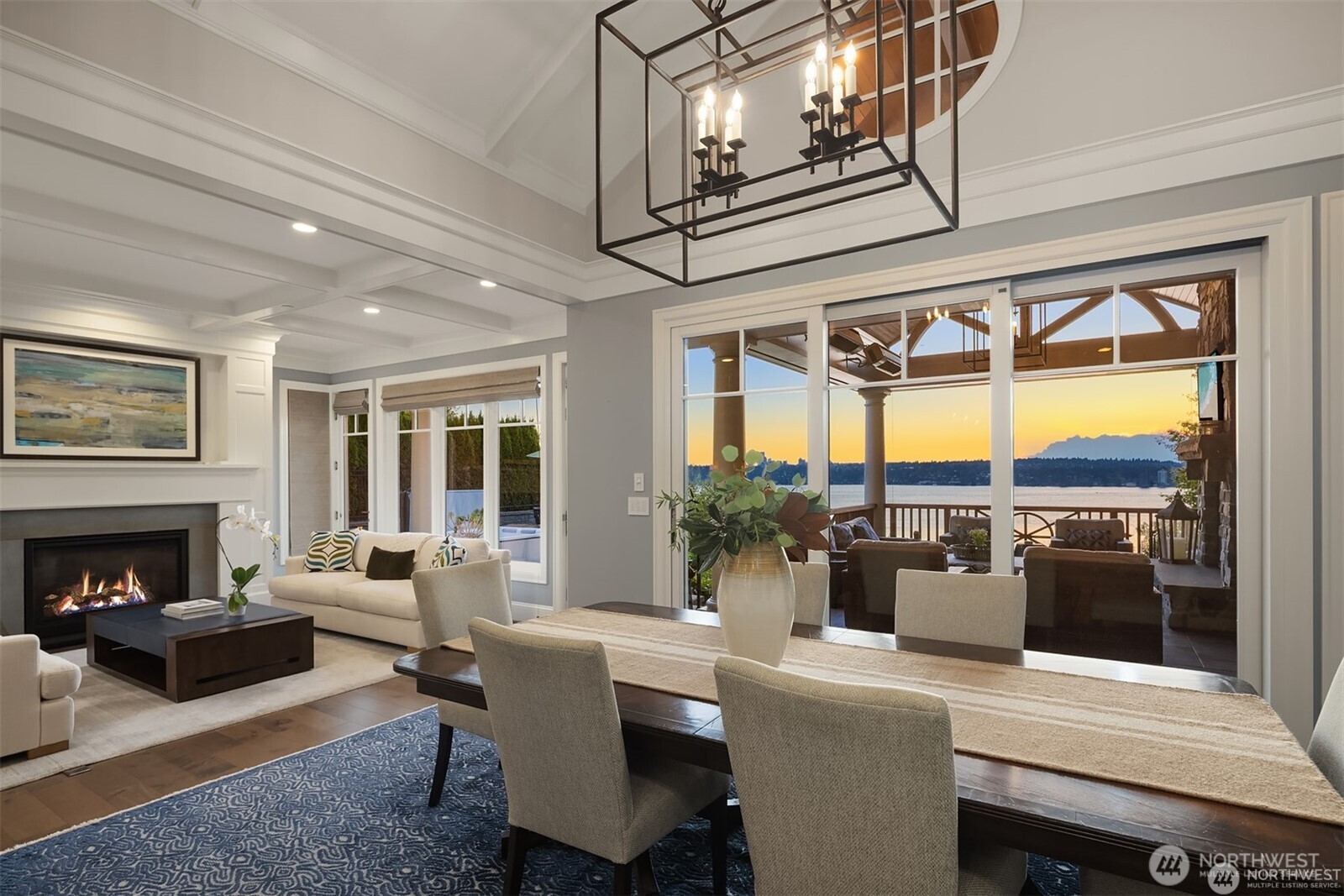 This communication between this dining area and the covered outdoor room is just sublime. The owners say this is the heart of the home that everyone loves! Enjoy walls of glass or the great outdoors for your symphony of year round color.
