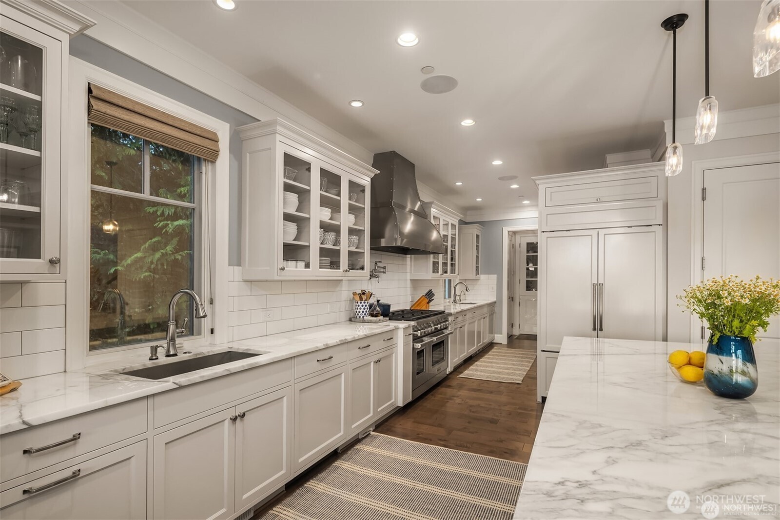 This dreamy kitchen was designed by a serious entertainer /chef and it shows! The flow and professional appliances is ideal and so great for dinner for 2 or 20!