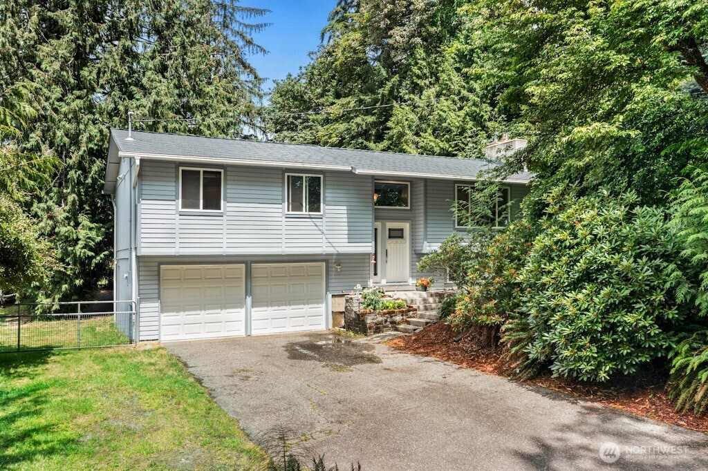Home has attached 2 car garage plus a 38 x 36' detached garage/shop.