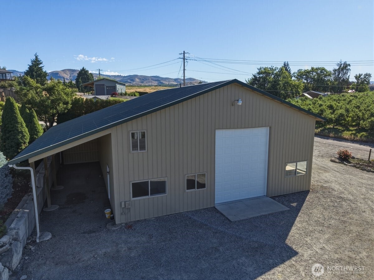 Beautifully maintained .54-acre property offering privacy, functionality, and year-round Lake Chelan enjoyment.