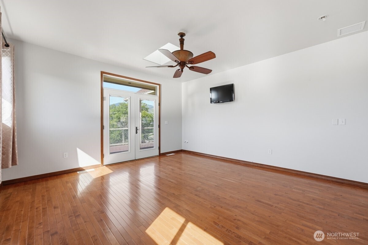 Sweeping Lake Chelan views from this exceptional Manson lifestyle property just minutes from downtown, wineries, boating, and recreation.