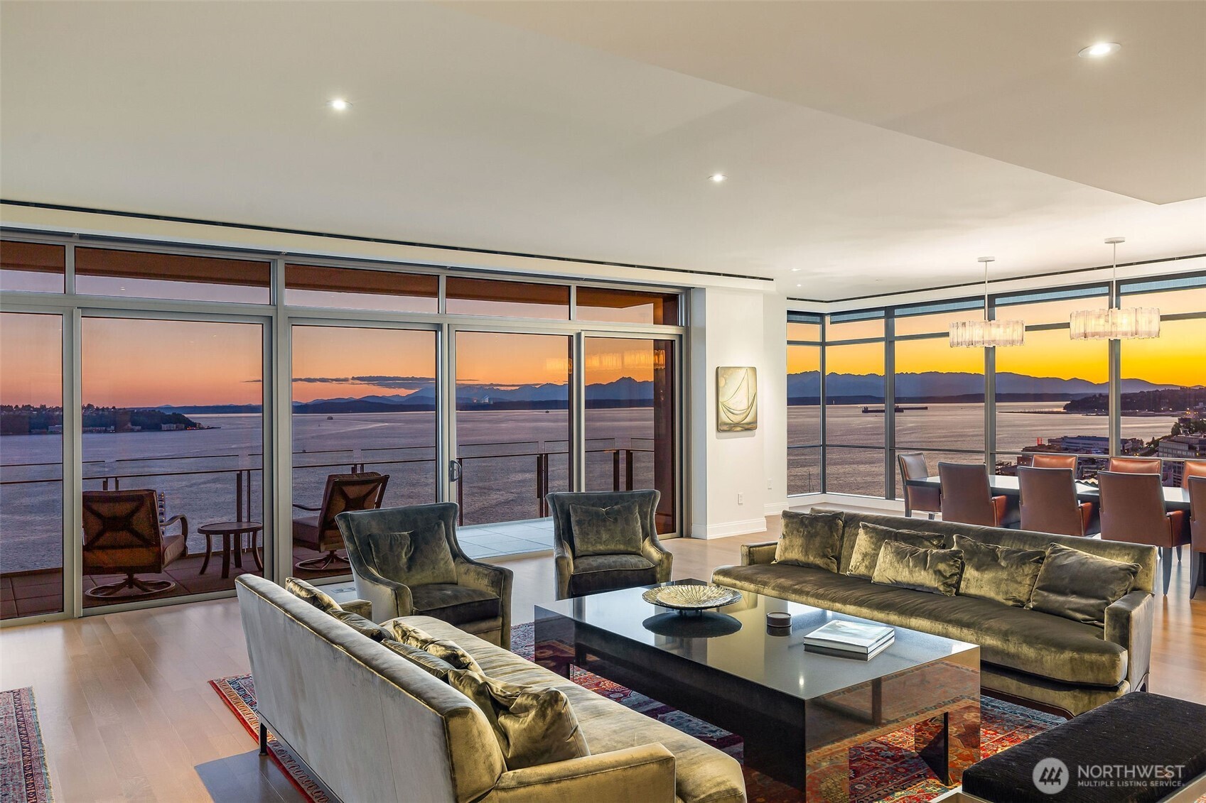 Kitchen with high end stainless appliances, and wine frigerator.