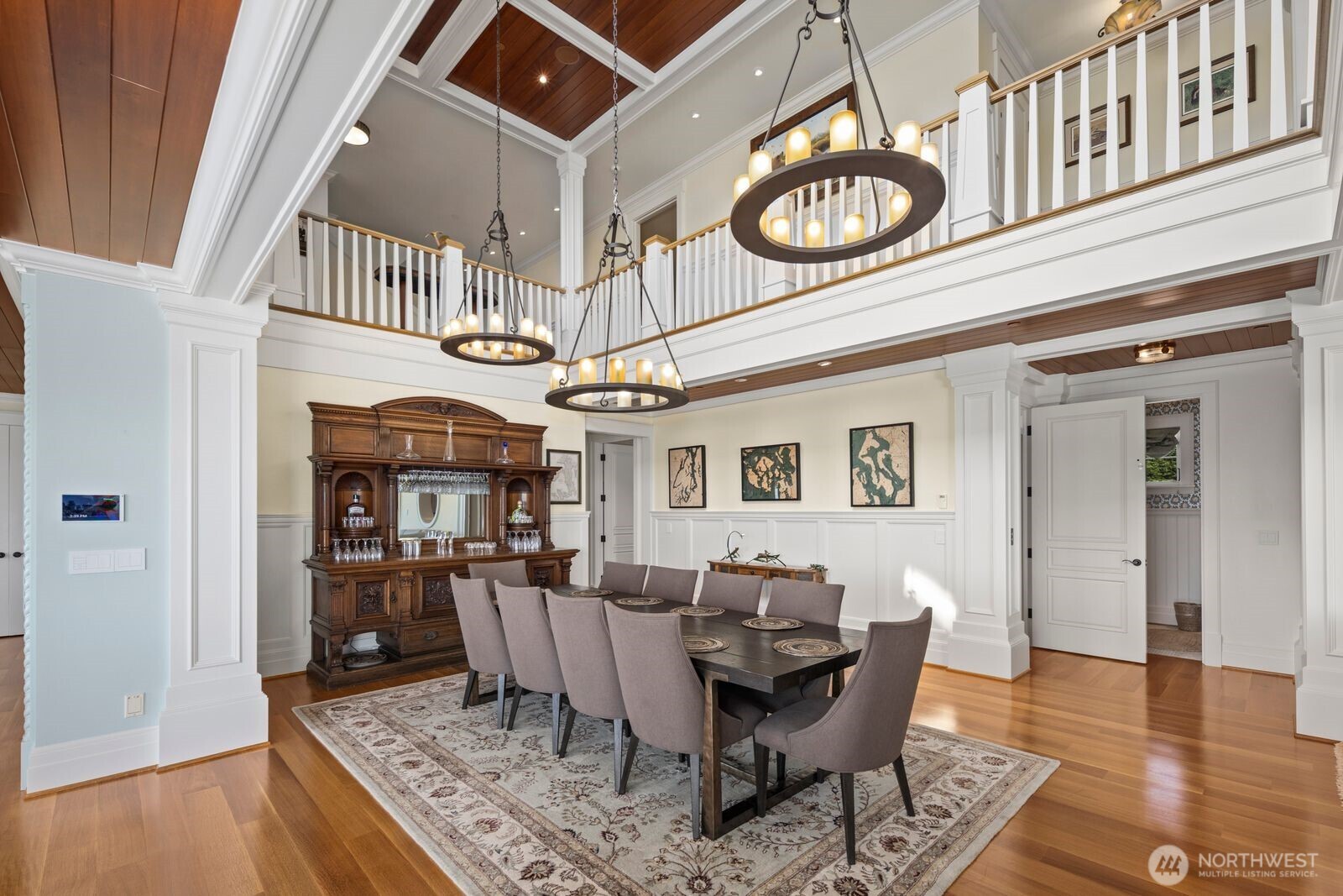 The formal dining area is designed for memorable gatherings, complemented by soaring ceilings and refined architectural details.
