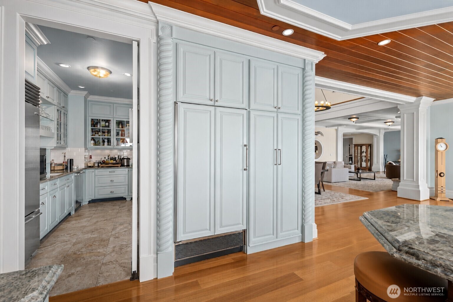 Designed for effortless entertaining, the butler's pantry features a built-in Miele coffee system, wine refrigerator, additional Sub-Zero refrigeration and freezer space, plus generous storage and prep areas.