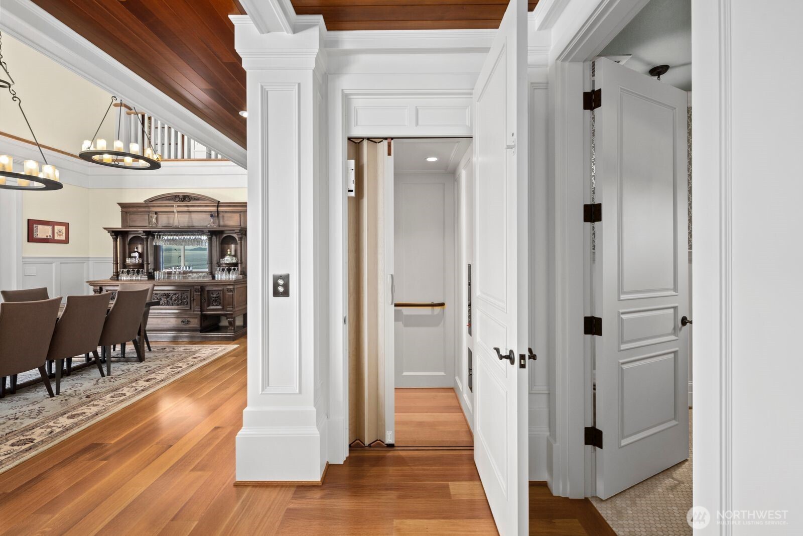 A private elevator seamlessly connects all three levels, combining convenience with thoughtful design.