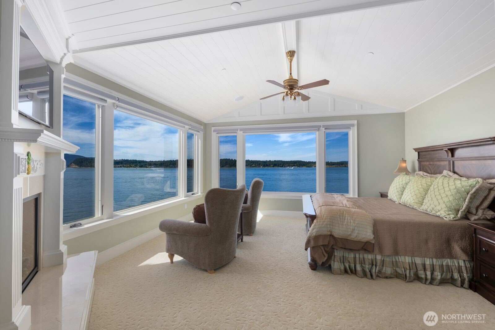 Wake up to breathtaking waterfront views in the serene primary suite, designed as a true retreat.