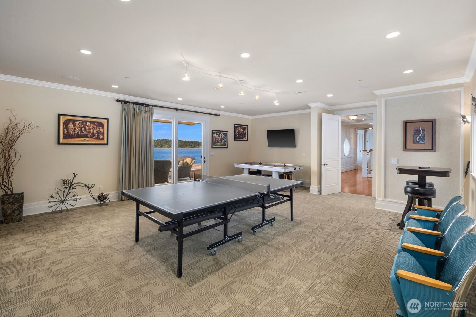 The lower-level recreation room is designed for fun and flexibility, with ample space for games, and casual gatherings.