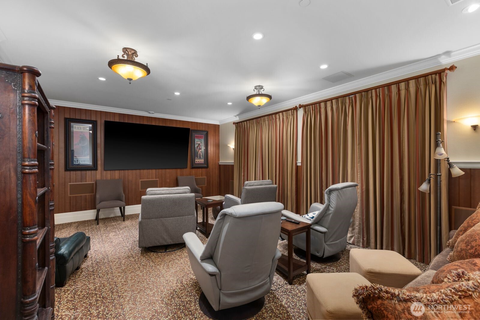 Host unforgettable movie nights in the dedicated home theater, featuring state of the art sound system, comfortable seating and an immersive viewing experience.