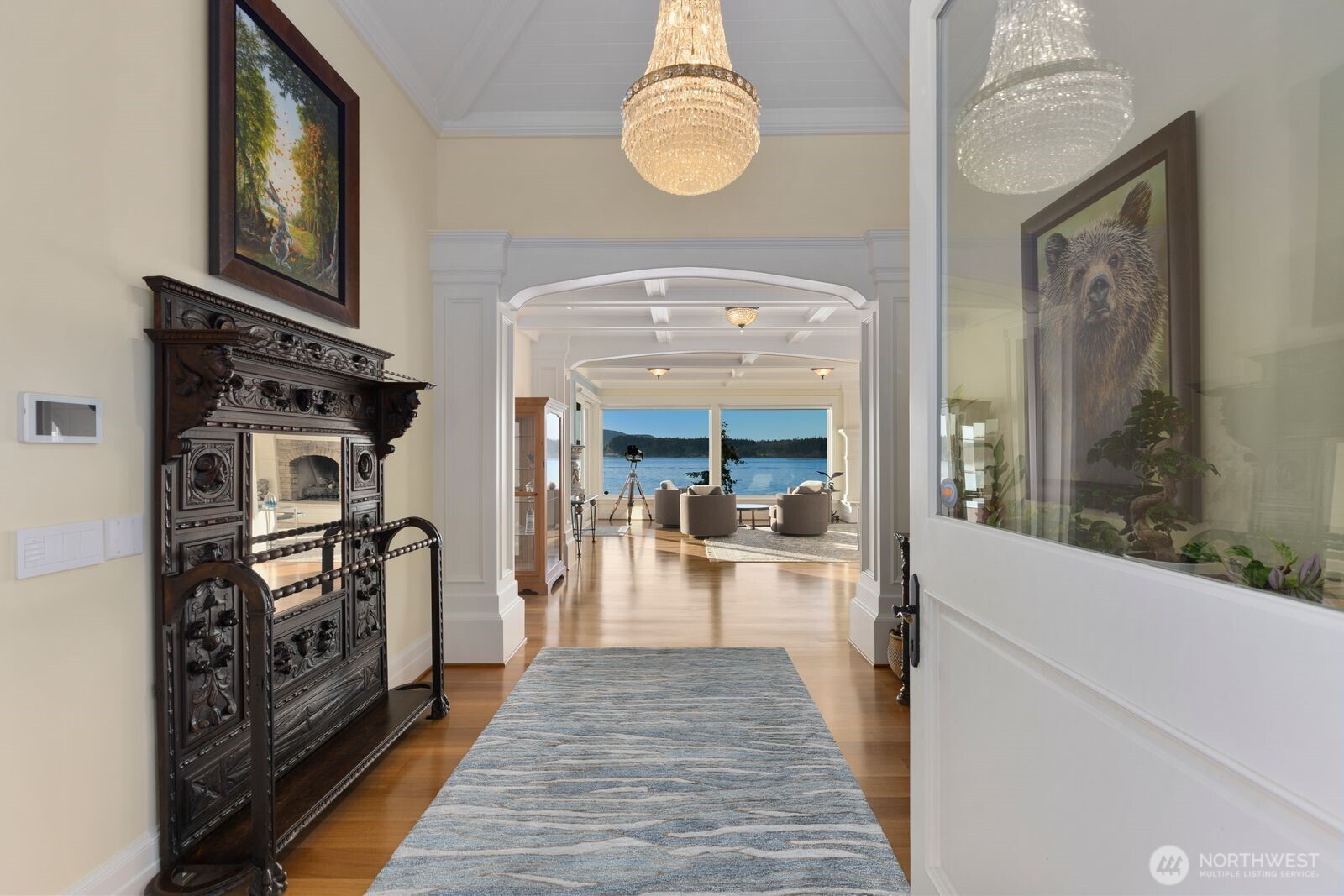 Light-filled interiors blend warmth and sophistication with soaring ceilings, rich hardwoods, and thoughtfully designed living spaces.