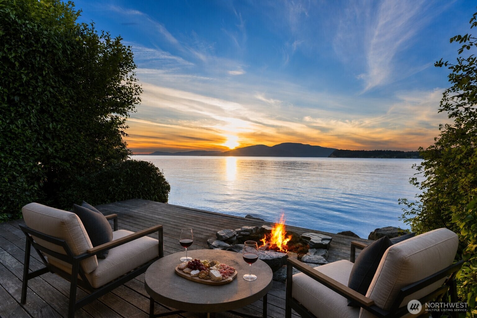Virtually staged. Gather around the fire pit and take in sweeping waterfront sunsets from this private waterside viewing deck designed for unforgettable evenings by the water.