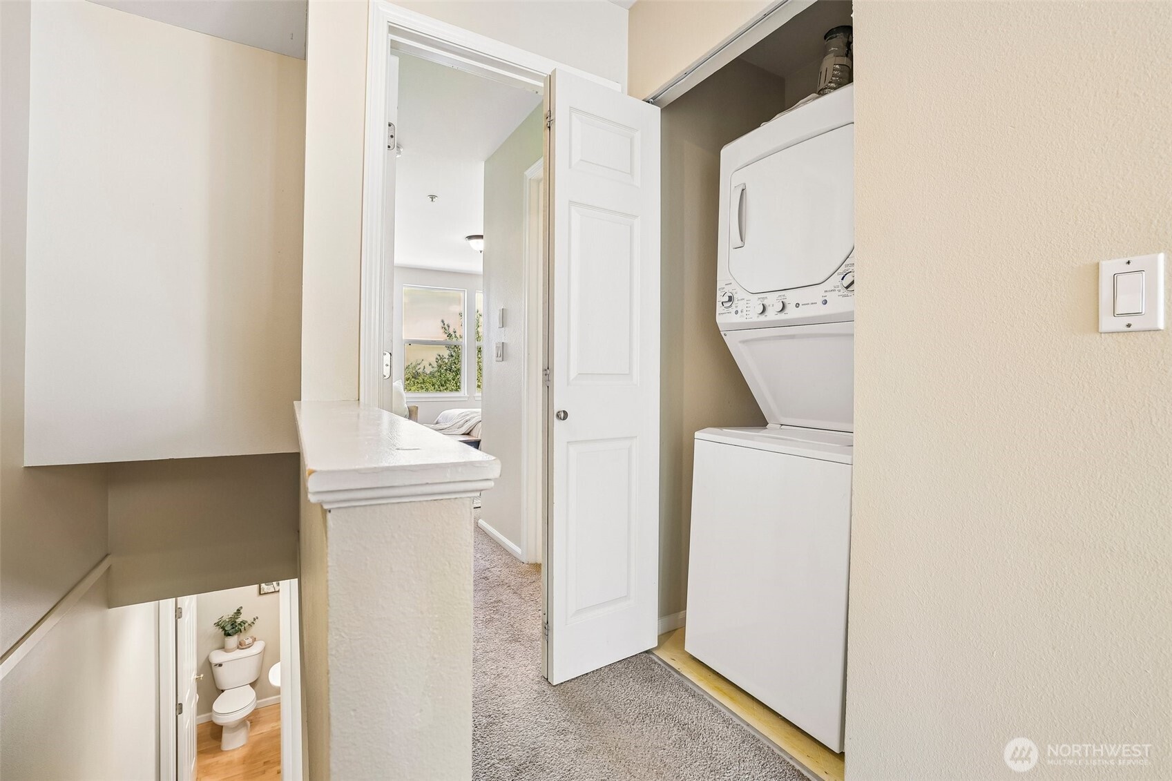 Laundry located near the bedrooms.