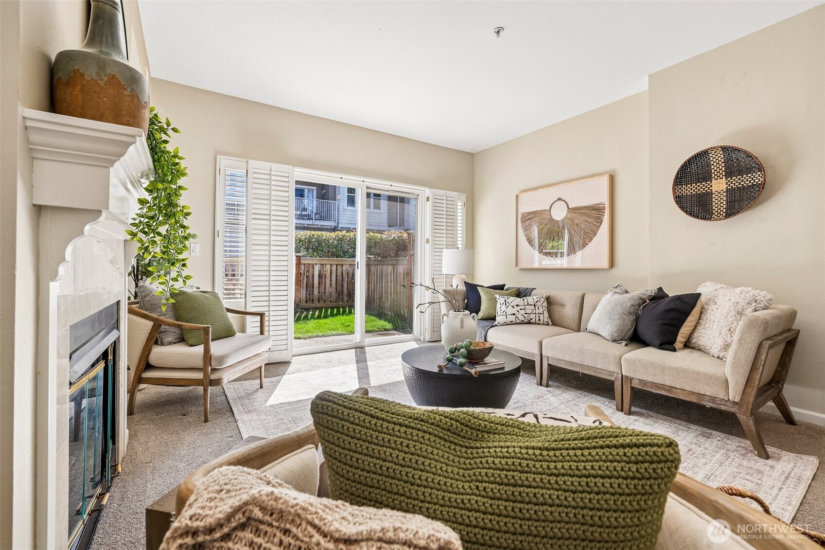The living room opens to the cute yard.