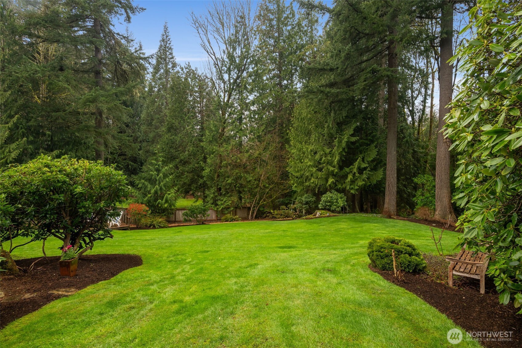 Lush gardens surround this stately home
