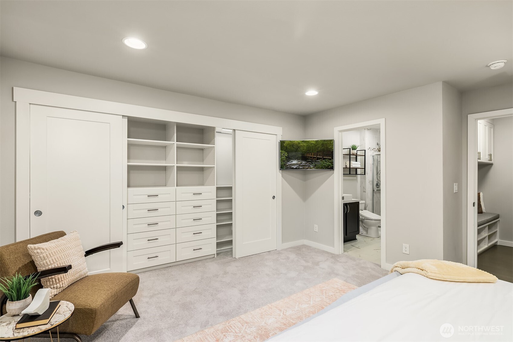 Upgraded closet system includes drawer and hanging space and automatic lighting. All the bells and whistles!