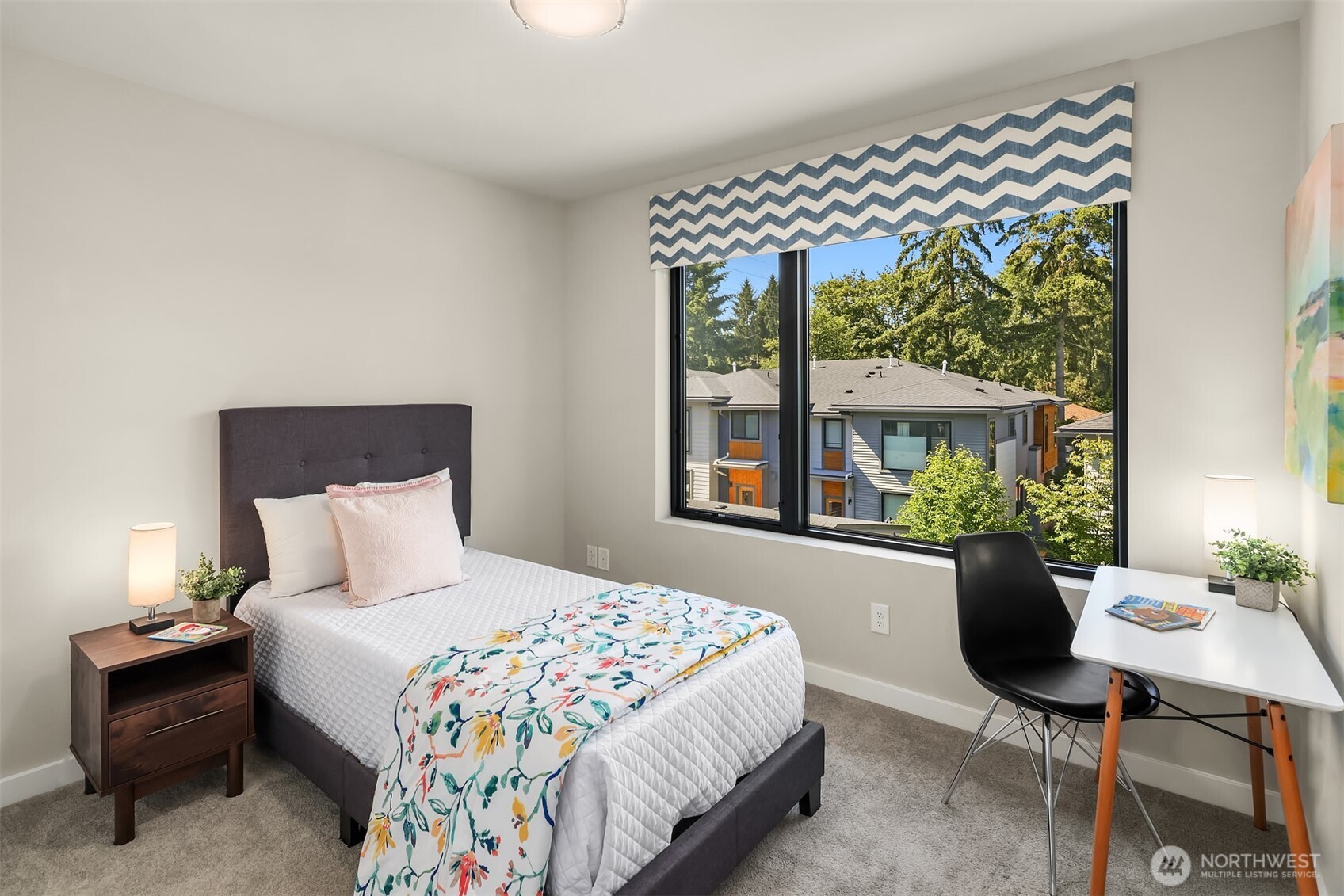 Secondary bedroom - it's possible to fit a full or two twins in this room.