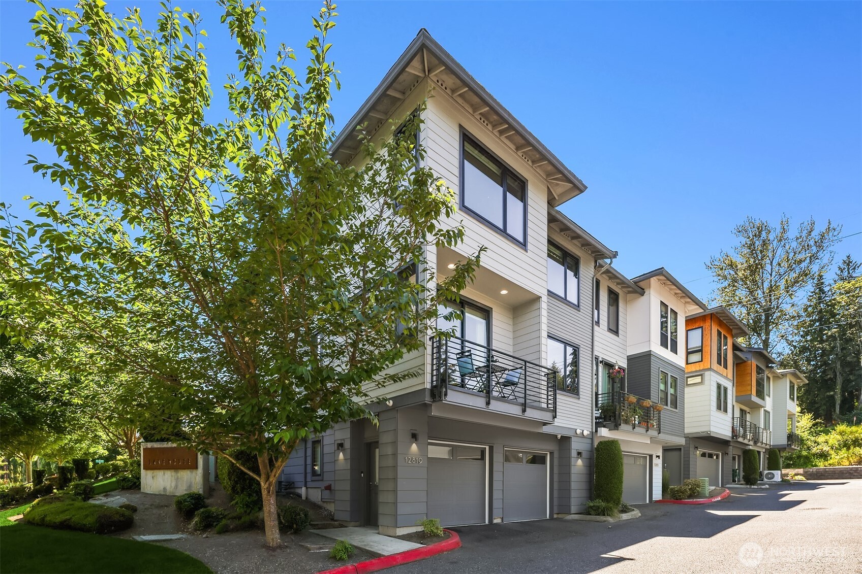 Attached 2-car garage. This home is a prime location within the community and an end unit for optimal light, and privacy