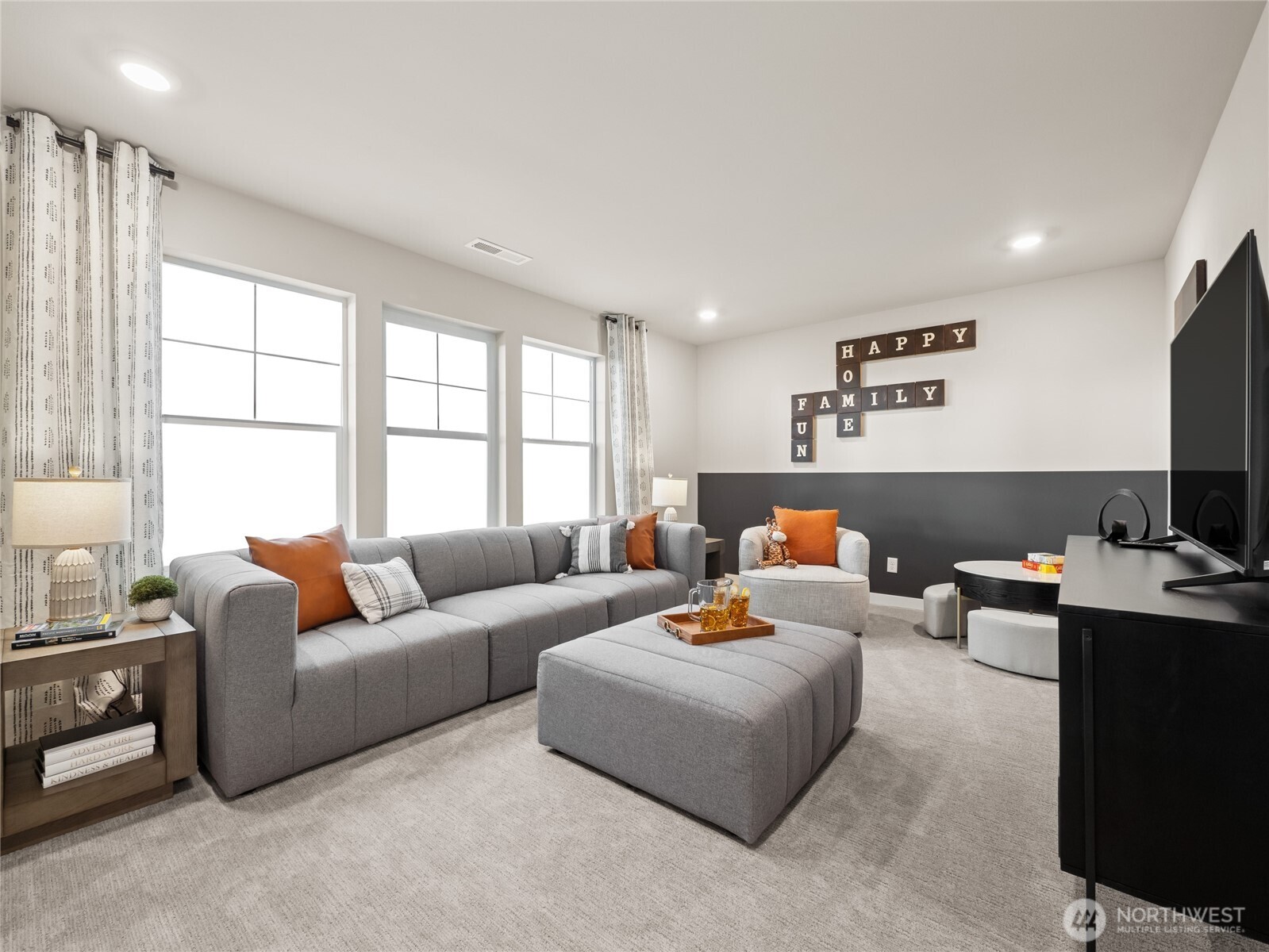 Spacious bonus room/bedroom. Photo is representational. Actual home is under construction and finishes and paint colors may vary. See site agent for details....
