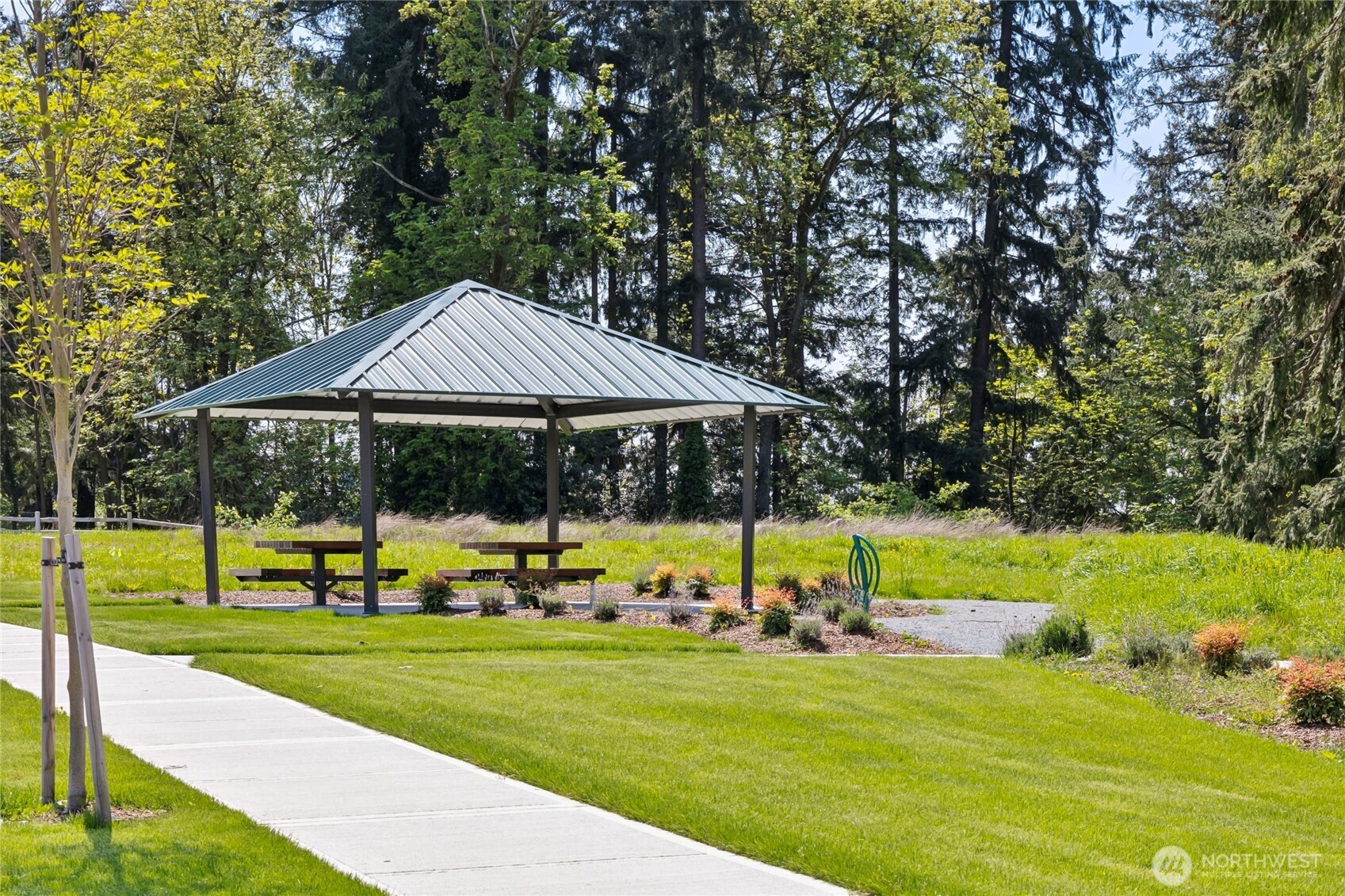 Pavilion with picnic tables and benches.