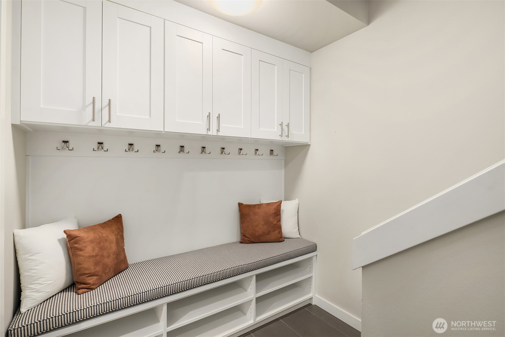 Lower level mudroom, just off the garage, with lots of storage - a lovely upgrade that the owners added