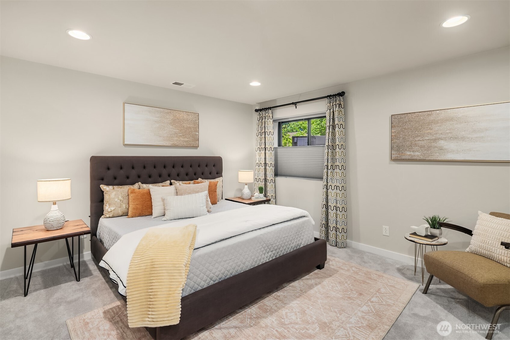 There's a huge private guest suite on the lower level. Owner added a full custom closet system and upgraded the attached three quarter bath