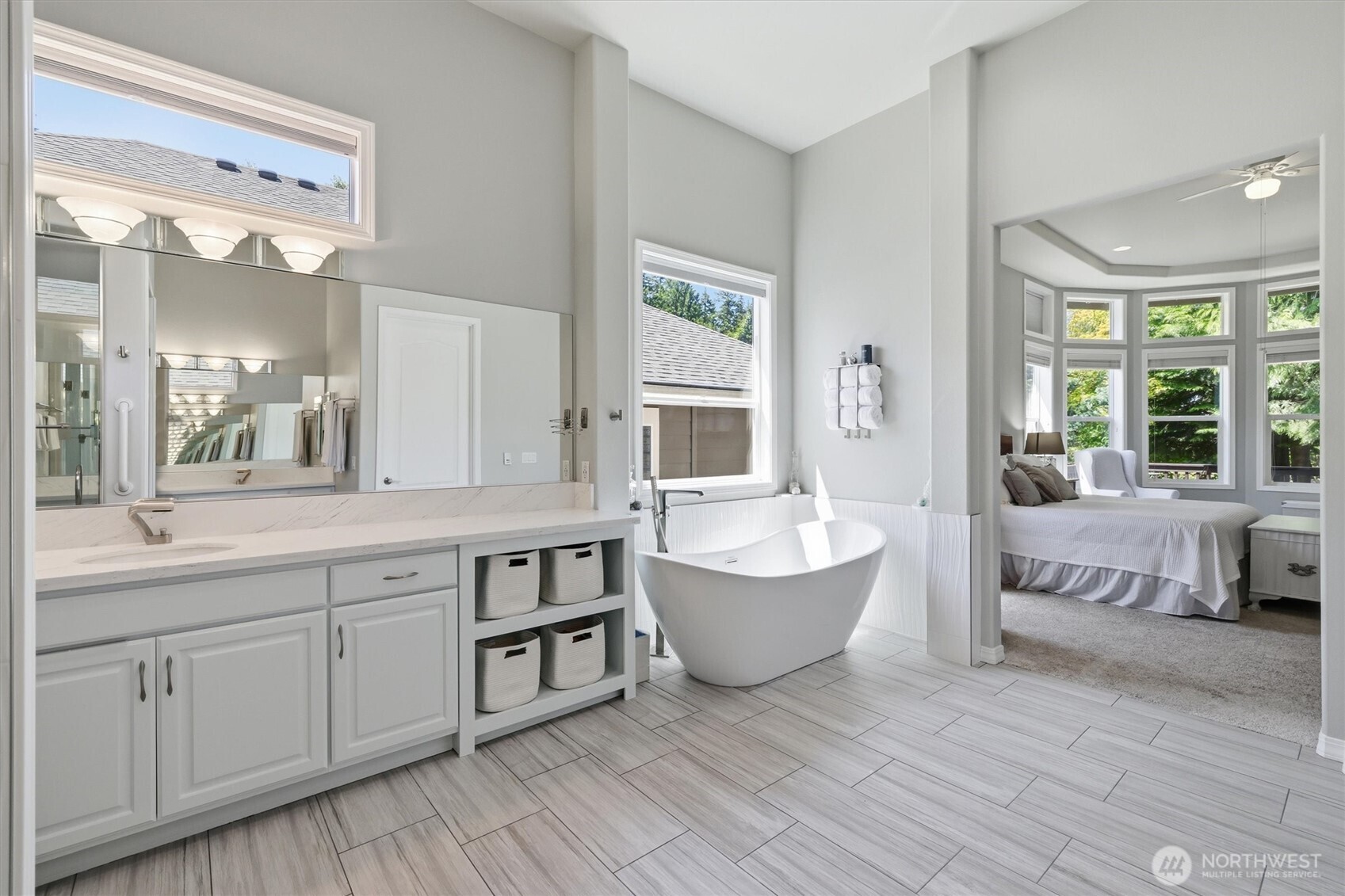 Primary bath has just been remodeled with free-standing soaking tub and heated floors.