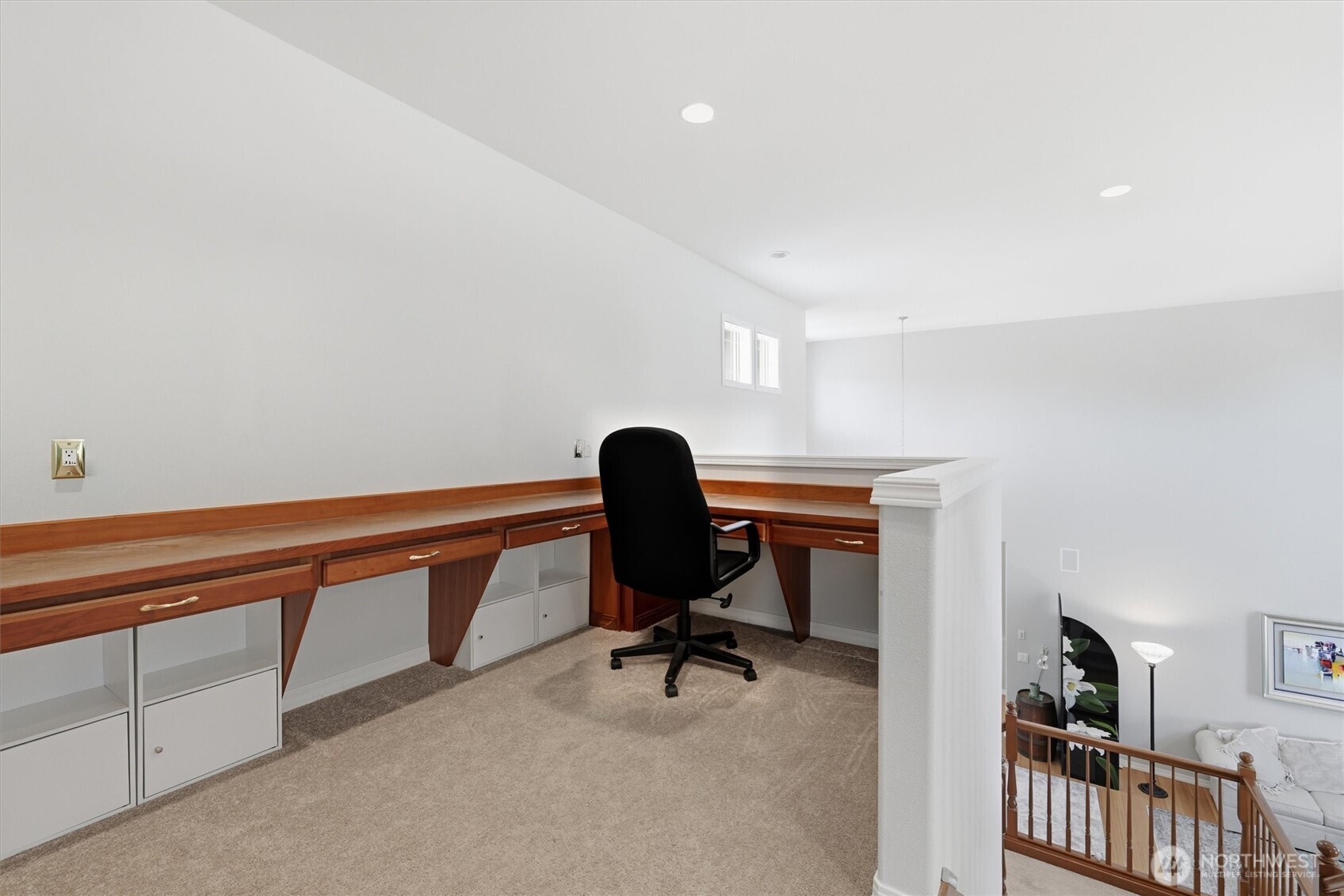 This loft office could be great as a hobby or craft space!