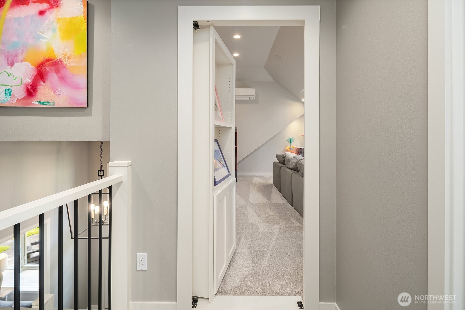The newly added upstairs bath features a sleek glass-enclosed tile shower and modern finishes, providing added convenience and flexibility for the four spacious bedrooms on the upper level.