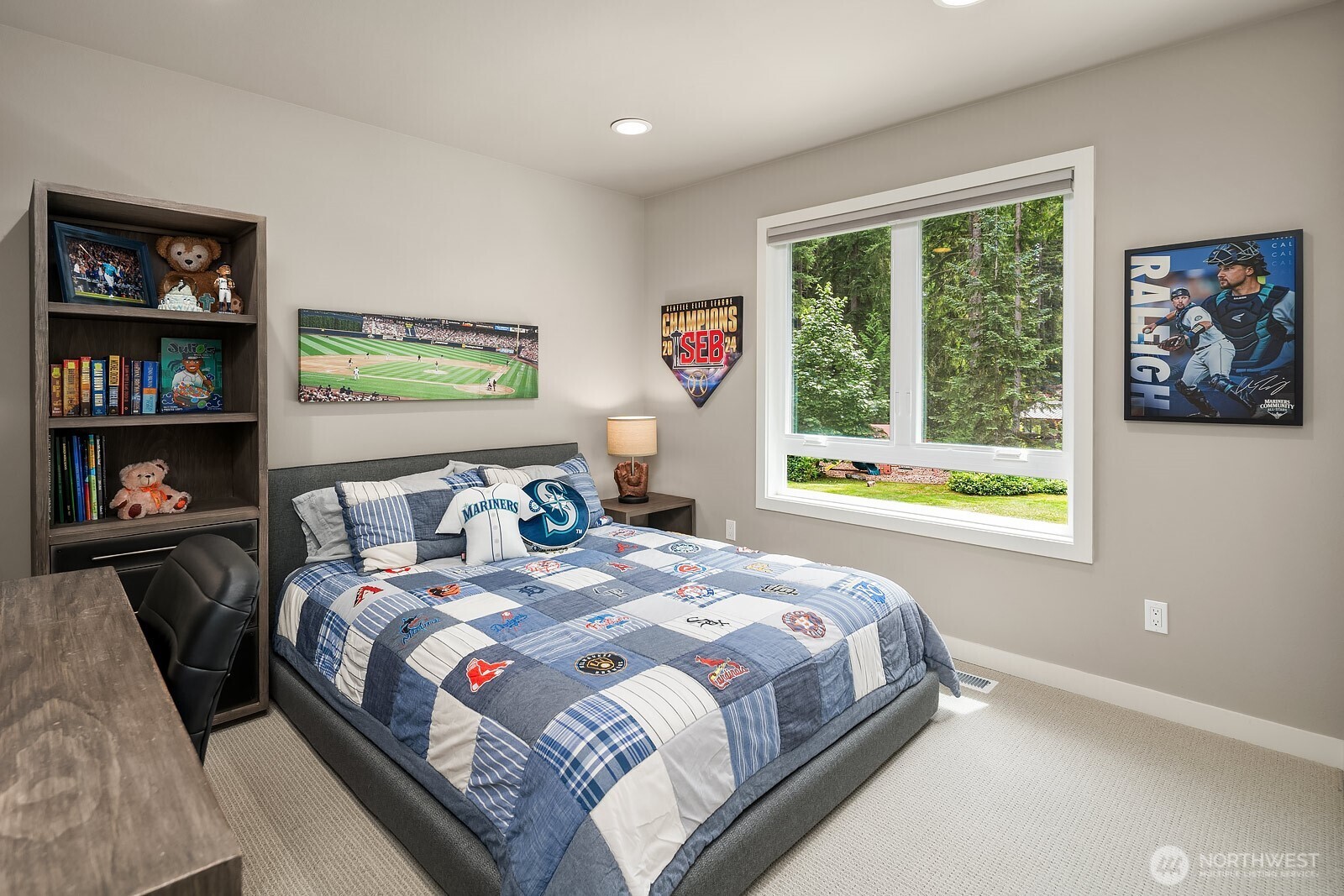 Another generously sized upstairs bedroom features new windows, neutral finishes, and ample space, offering comfort and flexibility for family members or guests.