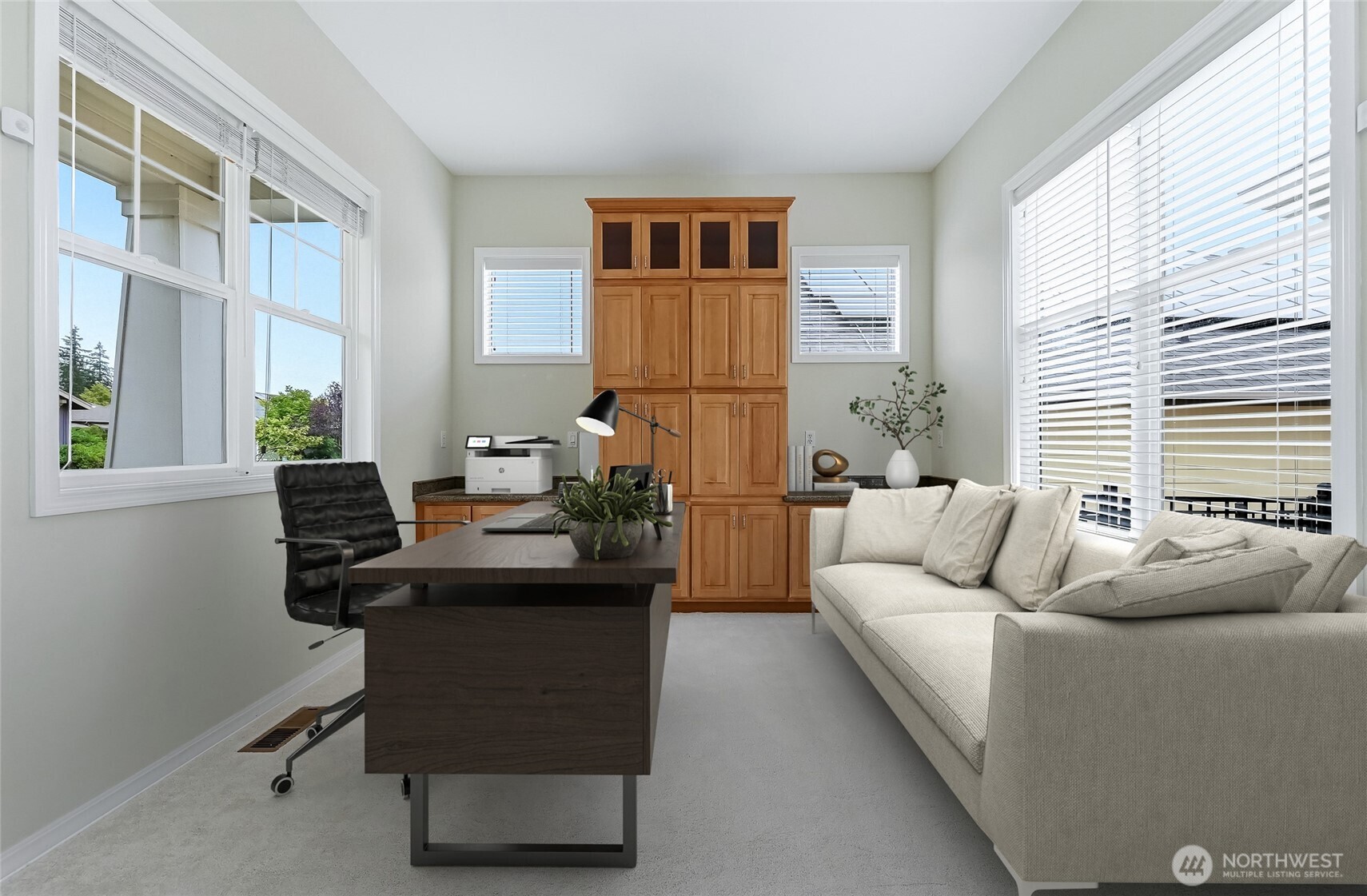 Office with a wall of built-ins, virtually staged.